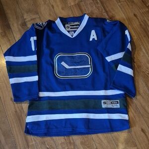 Reebok Blue Kids Hockey Jersey with White and Dark Green Trim